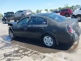 2003 Nissan Altima S with VIN 1N4AL11D03C129562, listed as a IAAI auction lot 41911150 with 205,862 mi miles. Bid and sale history available at carsss.com. Image 14.