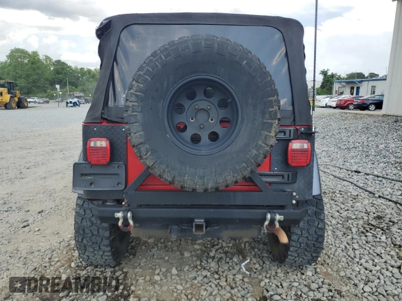 2004 Jeep Wrangler X с VIN 1J4FA39SX4P790444, выставлен на аукционе Copart как лот 56385635 с пробегом 195 355 миль миль и Списание • Salvage title. История ставок и продаж доступна на DreamBid. Изображение 6.