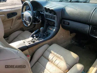 1998 Mitsubishi 3000GT VR-4 z VIN JA3AN74K5WY000630, wystawiony jako Copart lot #65715174 z przebiegiem 78 662 mil mil oraz Tytuł czysty. Historia ofert i sprzedaży dostępna na DreamBid. Obrazek 8.