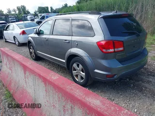 2012 Dodge Journey SXT with VIN 3C4PDCBG3CT310679, listed as a IAAI auction lot 42731771 with 165,928 mi miles and . Bid and sale history available at DreamBid. Image 3.