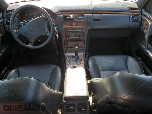 1998 Mercedes-Benz E-Class with VIN WDBJF65F4WA646422, listed as a Copart auction lot 88982785 with 281,524 mi miles and Salvage Title. Bid and sale history available at carsss.com. Image 8.
