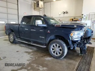 2023 Ram 2500 Laramie with VIN 3C6UR5FL5PG500920, listed as a Copart auction lot 82865454 with 35,330 mi miles and Salvage title. Bid and sale history available at DreamBid. Image 4.