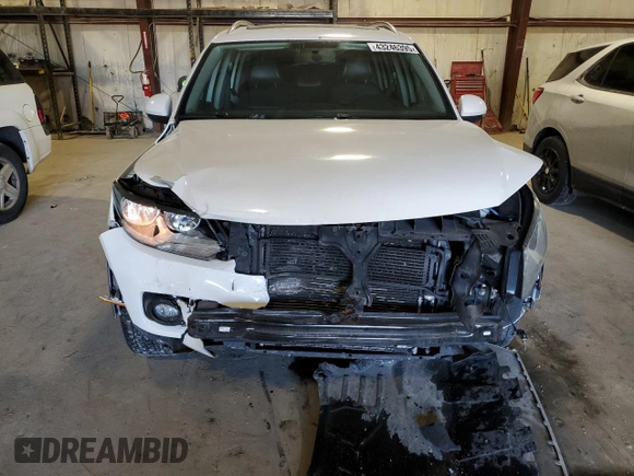 2012 Volkswagen Tiguan SE with VIN WVGAV7AX8CW533592, listed as a Copart auction lot 43246395 with 149,928 mi miles and Salvage Title. Bid and sale history available at DreamBid. Image 5.