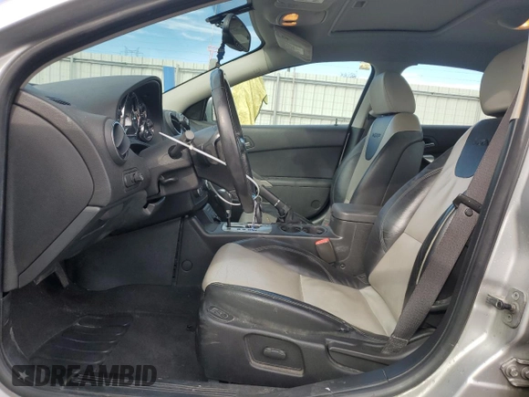 2009 Pontiac G6 with VIN 1G2ZL577094232011, listed as a Copart auction lot 77175054 with 133,353 mi miles and Salvage title. Bid and sale history available at DreamBid. Image 7.