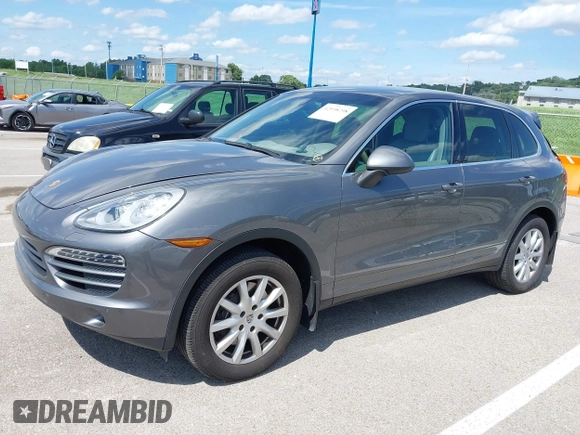 2014 Porsche Cayenne z VIN WP1AA2A2XELA91523, wystawiony jako IAAI lot #42538298 z przebiegiem 67 001 mil mil oraz . Historia ofert i sprzedaży dostępna na DreamBid. Obrazek 14.