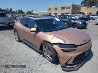 2023 Genesis GV60 Performance z VIN KMUKEDTB2PU008745, wystawiony jako IAAI lot #42444127 z przebiegiem 12 138 mil mil oraz . Historia ofert i sprzedaży dostępna na DreamBid. Obrazek 6.
