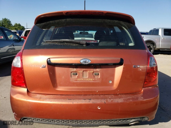 2007 Kia Spectra with VIN KNAFE162X75009714, listed as a Copart auction lot 69094894 with 206,173 mi miles and Salvage Title. Bid and sale history available at carsss.com. Image 6.