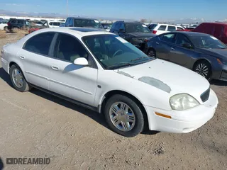 2003 Mercury Sable LS Premium with VIN 1MEHM55S73G630347, listed as a IAAI auction lot 41427588 with 125,285 mi miles. Bid and sale history available at carsss.com. Image 1.