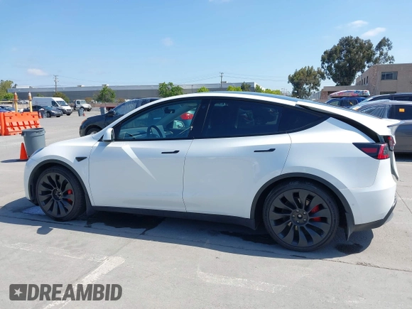 2022 Tesla Model Y Performance z VIN 7SAYGDEF2NF347456, wystawiony jako IAAI lot #42177725 z przebiegiem 29 374 mil mil oraz . Historia ofert i sprzedaży dostępna na DreamBid. Obrazek 15.