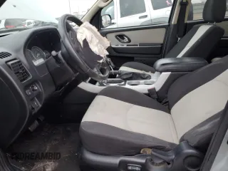 2005 Mercury Mariner Luxury z VIN 4M2CU57105DJ33266, wystawiony jako Copart lot #87002044 z przebiegiem 164 313 mil mil oraz Szkody całkowita. Historia ofert i sprzedaży dostępna na DreamBid. Obrazek 7.
