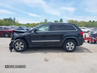 2011 Jeep Grand Cherokee Laredo z VIN 1J4RR4GG0BC547689, wystawiony jako IAAI lot #42230005 z przebiegiem 192 361 mil mil oraz . Historia ofert i sprzedaży dostępna na DreamBid. Obrazek 14.