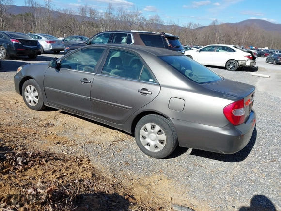 2004 Toyota Camry LE with VIN 4T1BE32K54U904138, listed as a IAAI auction lot 41792208 with 217,829 mi miles and . Bid and sale history available at carsss.com. Image 3.