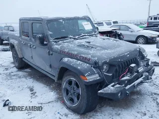 2020 Jeep Gladiator Rubicon with VIN 1C6JJTBG3LL146075, listed as a IAAI auction lot 41048823 with 130,318 mi miles and . Bid and sale history available at DreamBid. Image 1.