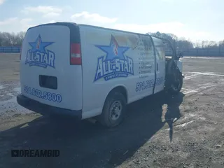 2014 Chevrolet Express Cargo Van with VIN 1GCWGGBA3E1214227, listed as a IAAI auction lot 41571911 with 1 mi miles. Bid and sale history available at carsss.com. Image 4.