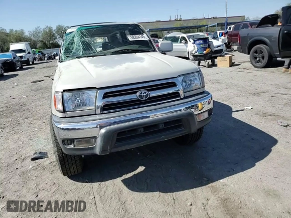 1999 Toyota 4Runner SR5 with VIN JT3GN86R4X0099618, listed as a Copart auction lot 58204145 with 297,759 mi miles and Salvage title. Bid and sale history available at DreamBid. Image 14.
