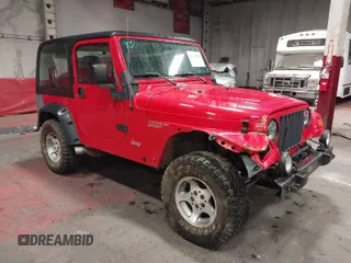 2004 Jeep Wrangler Sport with VIN 1J4FA49S04P722840, listed as a IAAI auction lot 41702079 with 203,243 mi miles. Bid and sale history available at carsss.com. Image 1.