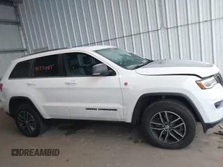 2018 Jeep Grand Cherokee Trailhawk with VIN 1C4RJFLGXJC264438, listed as a IAAI auction lot 40974417 with 117,717 mi miles and . Bid and sale history available at DreamBid. Image 13.