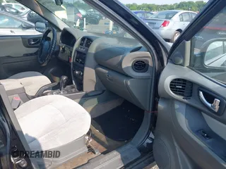 2006 Hyundai Santa Fe GLS z VIN KM8SC13D36U099043, wystawiony jako IAAI lot #42447356 z przebiegiem 154 838 mil mil oraz . Historia ofert i sprzedaży dostępna na DreamBid. Obrazek 5.