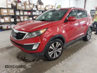 2011 Kia Sportage EX with VIN KNDPC3A29B7013959, listed as a IAAI auction lot 42196494 with 103,850 mi miles and . Bid and sale history available at carsss.com. Image 2.