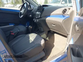 2015 Chevrolet Spark LS with VIN KL8CB6S94FC751401, listed as a IAAI auction lot 42032919 with 61,149 mi miles and . Bid and sale history available at DreamBid. Image 5.