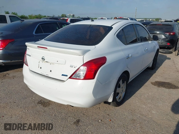 2014 Nissan Versa SV with VIN 3N1CN7AP5EL853686, listed as a IAAI auction lot 42058524 with 156,947 mi miles. Bid and sale history available at carsss.com. Image 4.