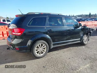 2013 Dodge Journey SXT with VIN 3C4PDCBGXDT589405, listed as a IAAI auction lot 41421902 with 152,964 mi miles and . Bid and sale history available at DreamBid. Image 4.
