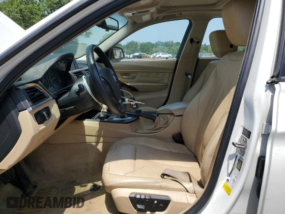2013 BMW 3 Series 328i with VIN WBA3A5G58DNP21035, listed as a Copart auction lot 60543305 with 151,768 mi miles and Salvage title. Bid and sale history available at DreamBid. Image 7.