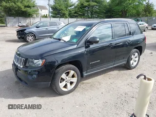 2016 Jeep Compass Sport with VIN 1C4NJDBB7GD757344, listed as a IAAI auction lot 42184933 with 199,430 mi miles and . Bid and sale history available at carsss.com. Image 2.