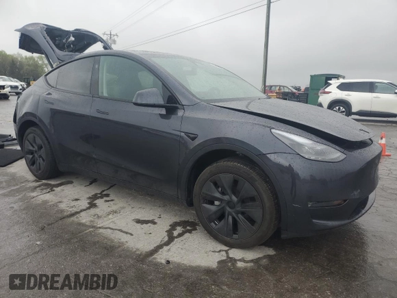 2024 Tesla Model Y with VIN 7SAYGDED1RA321691, listed as a Copart auction lot 52153945 with 7,544 mi miles and Salvage Title. Bid and sale history available at DreamBid. Image 4.