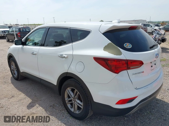 2017 Hyundai Santa Fe 2.4L with VIN 5NMZTDLB5HH018198, listed as a IAAI auction lot 42523632 with 144,883 mi miles and . Bid and sale history available at DreamBid. Image 12.