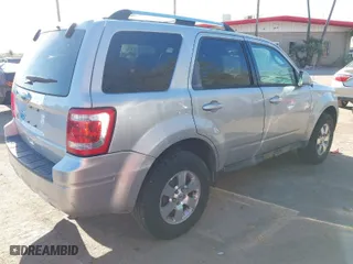 2012 Ford Escape Limited with VIN 1FMCU0E78CKB80338, listed as a IAAI auction lot 41885382 with 169,398 mi miles. Bid and sale history available at carsss.com. Image 4.