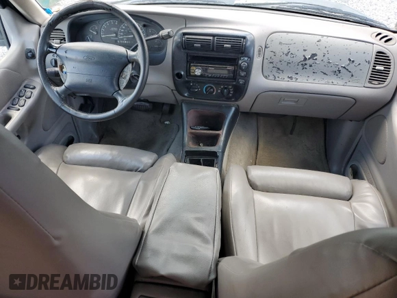 1996 Ford Explorer XLT z VIN 1FMDU32P0TZA75326, wystawiony jako Copart lot #43005845 z przebiegiem 67 286 mil mil oraz Szkoda całkowita • Salvage title. Historia ofert i sprzedaży dostępna na DreamBid. Obrazek 8.