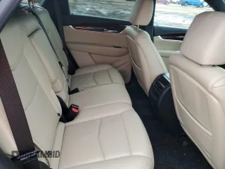 2019 Cadillac XT5 Luxury FWD with VIN 1GYKNCRSXKZ132871, listed as a Copart auction lot 54879405 with 57,325 mi miles and Salvage title. Bid and sale history available at DreamBid. Image 11.