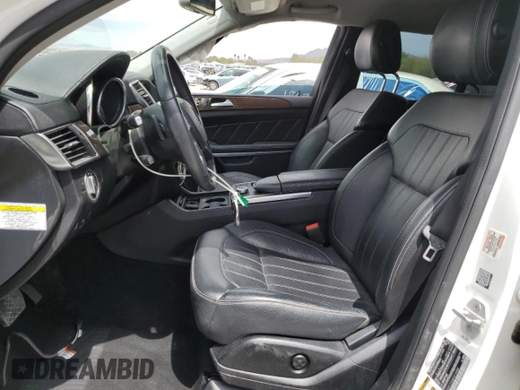 2014 Mercedes-Benz GL 450 z VIN 4JGDF7CE4EA314084, wystawiony jako Copart lot #59593195 z przebiegiem 161 026 mil mil oraz Szkoda całkowita • Salvage title. Historia ofert i sprzedaży dostępna na DreamBid. Obrazek 7.