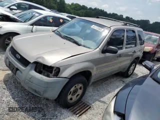 2001 Ford Escape with VIN 1FMUU01B31KE84740, listed as a Copart auction lot 61772565 with 246,051 mi miles and Salvage title. Bid and sale history available at DreamBid. Image 1.