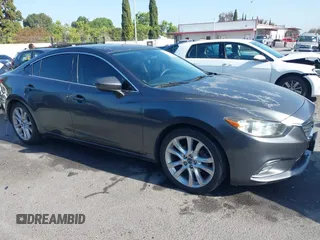 2015 Mazda 6 i Touring with VIN JM1GJ1V57F1185530, listed as a IAAI auction lot 42309098 with 76,236 mi miles and . Bid and sale history available at DreamBid. Image 1.