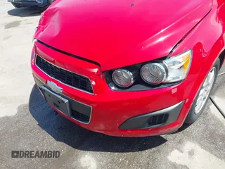 2012 Chevrolet Sonic LT with VIN 1G1JC5SH9C4130618, listed as a IAAI auction lot 42159538 with 120,367 mi miles and . Bid and sale history available at DreamBid. Image 6.