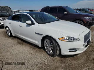 2014 Jaguar XJ Portfolio with VIN SAJWJ2GD6E8V74284, listed as a Copart auction lot 74577584 with 39,835 mi miles and Non repairable. Bid and sale history available at DreamBid. Image 4.