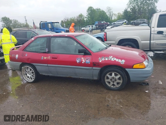 1995 Ford Escort z VIN 1FASP11J5SW107553, wystawiony jako IAAI lot #42202877 z przebiegiem 76 751 mil mil oraz . Historia ofert i sprzedaży dostępna na DreamBid. Obrazek 13.