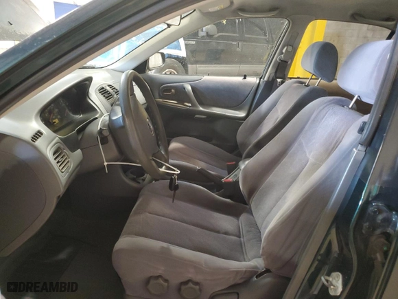 2000 Mazda Protege ES with VIN JM1BJ2216Y0199042, listed as a Copart auction lot 52282505 with 177,868 mi miles and Salvage Title. Bid and sale history available at carsss.com. Image 7.