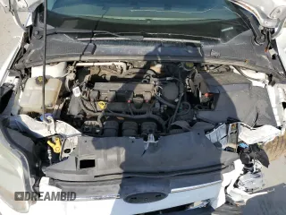 2014 Ford Focus SE z VIN 1FADP3K24EL345833, wystawiony jako Copart lot #57307075 z przebiegiem 158 787 mil mil oraz Szkoda całkowita • Salvage title. Historia ofert i sprzedaży dostępna na DreamBid. Obrazek 11.