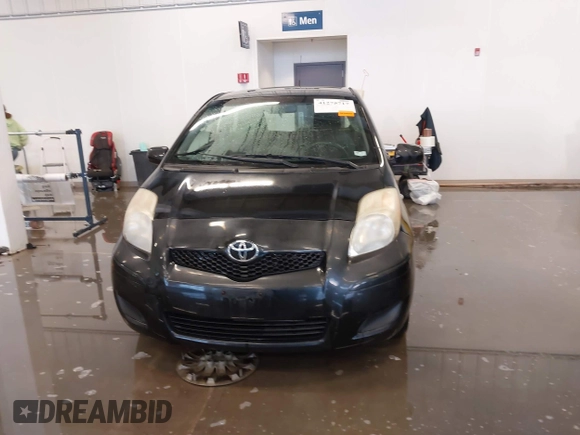 2011 Toyota Yaris with VIN JTDJT4K3XB5327229, listed as a IAAI auction lot 41275717 with 140,276 mi miles. Bid and sale history available at carsss.com. Image 12.