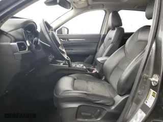 2020 Mazda CX-5 Touring with VIN JM3KFACM6L0797748, listed as a Copart auction lot 44573645 with 104,094 mi miles and Salvage Title. Bid and sale history available at carsss.com. Image 7.