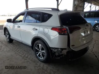 2018 Toyota RAV4 XLE with VIN JTMWFREV2JJ740145, listed as a Copart auction lot 52214075 with 129,940 mi miles and Salvage title. Bid and sale history available at DreamBid. Image 2.