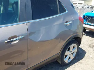 2015 Buick Encore with VIN KL4CJASB5FB036319, listed as a IAAI auction lot 42242748 with 106,579 mi miles and . Bid and sale history available at DreamBid. Image 6.