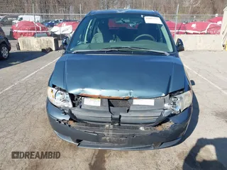 2006 Dodge Grand Caravan SE with VIN 1D4GP24R56B596611, listed as a IAAI auction lot 42057777 with 163,258 mi miles and . Bid and sale history available at DreamBid. Image 6.