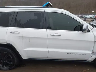 2014 Jeep Grand Cherokee Limited z VIN 1C4RJFBG8EC466380, wystawiony jako IAAI lot #38710809 z przebiegiem 169 540 mil mil oraz . Historia ofert i sprzedaży dostępna na DreamBid. Obrazek 13.