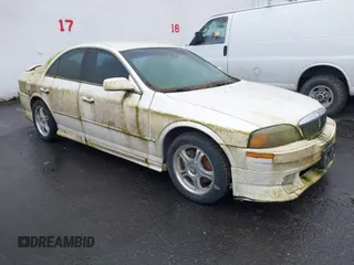 2000 Lincoln LS with VIN 1LNHM87A5YY873918, listed as a IAAI auction lot 41988309 with 1 mi miles. Bid and sale history available at carsss.com. Image 1.