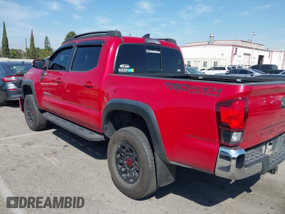 2018 Toyota Tacoma SR5 with VIN 3TMAZ5CN2JM067292, listed as a IAAI auction lot 41851959 with 70,988 mi miles and . Bid and sale history available at DreamBid. Image 14.