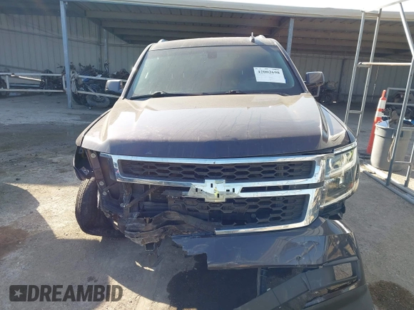 2015 Chevrolet Tahoe LS with VIN 1GNSCAKCXFR628303, listed as a IAAI auction lot 42002698 with 152,141 mi miles and . Bid and sale history available at DreamBid. Image 12.